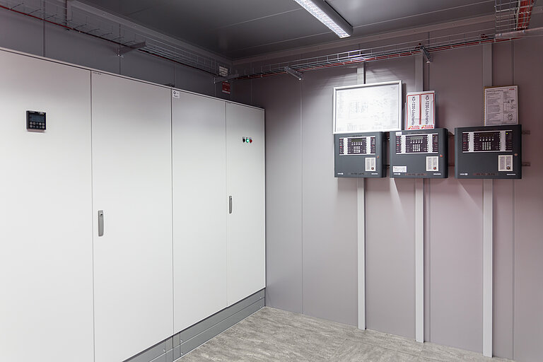 Separate technical room in the data center with power distribution and fire alarm system